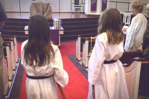 Acolytes: Bringing in the Light of Christ